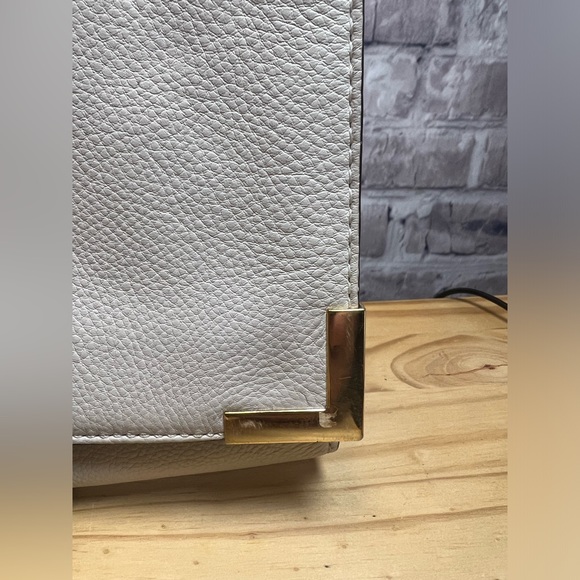 Michael Kors Pebbled Leather Clutch with Removable Strap - Picture 4 of 16